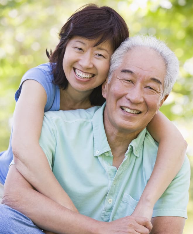 Happy couple with dentures, inHarmony Dental Care