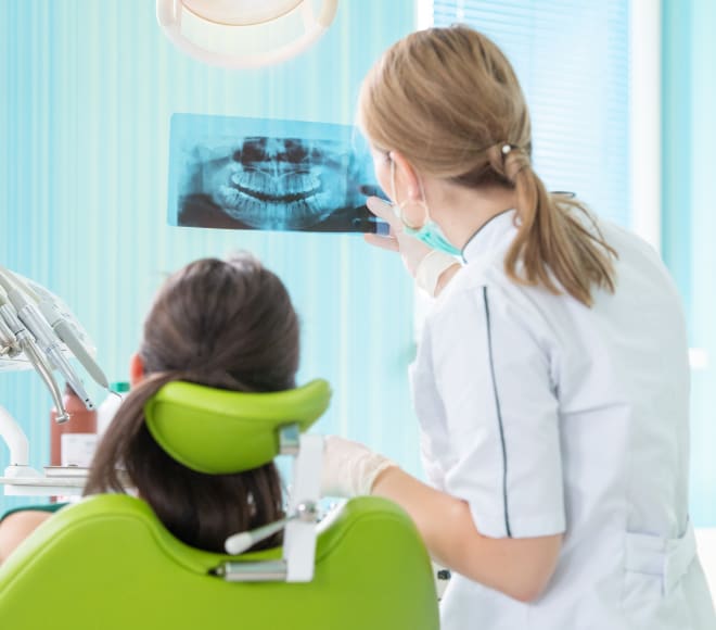 Hygienist reviews x-ray